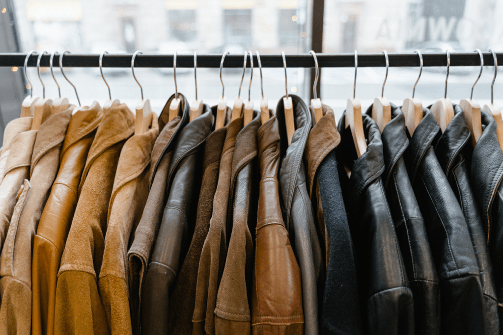 is faux leather durable genuine leather jackets on a clothing rack