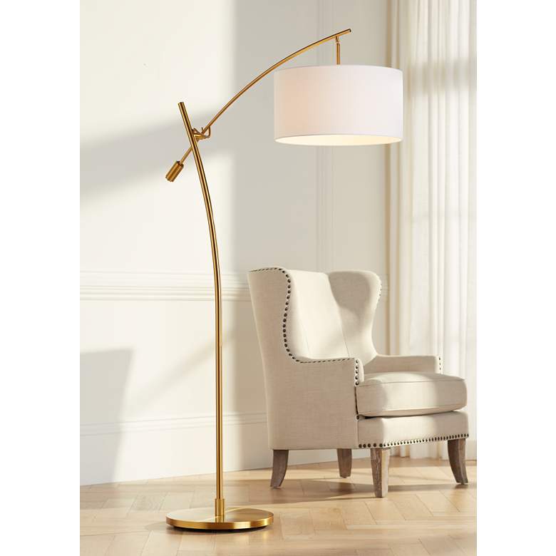 possini euro raymond warm gold adjustable boom arc floor lamp 707h1cropped